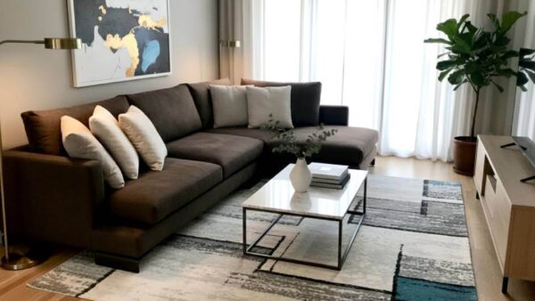 Divano angolare modello Isola in microfibra antimacchia marrone, artigianale Tino Mariani a Lissone