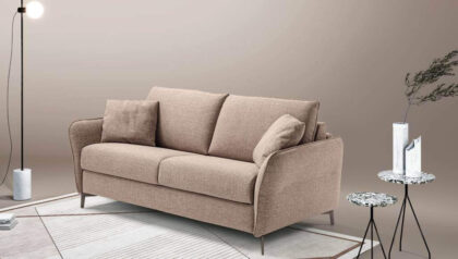 Elegance: il divano letto a una piazza e mezza con bracciolo compatto, inserito in una zona living moderna.