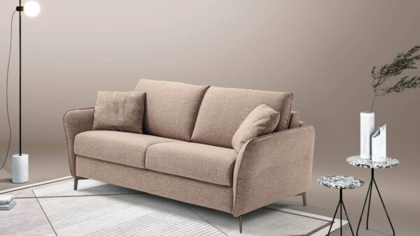 Elegance: il divano letto a una piazza e mezza con bracciolo compatto, inserito in una zona living moderna.